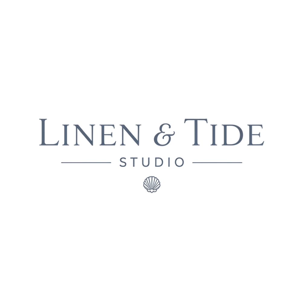 Logo of the creation studio Linen & Tide Studio which uses blue font and a shell.